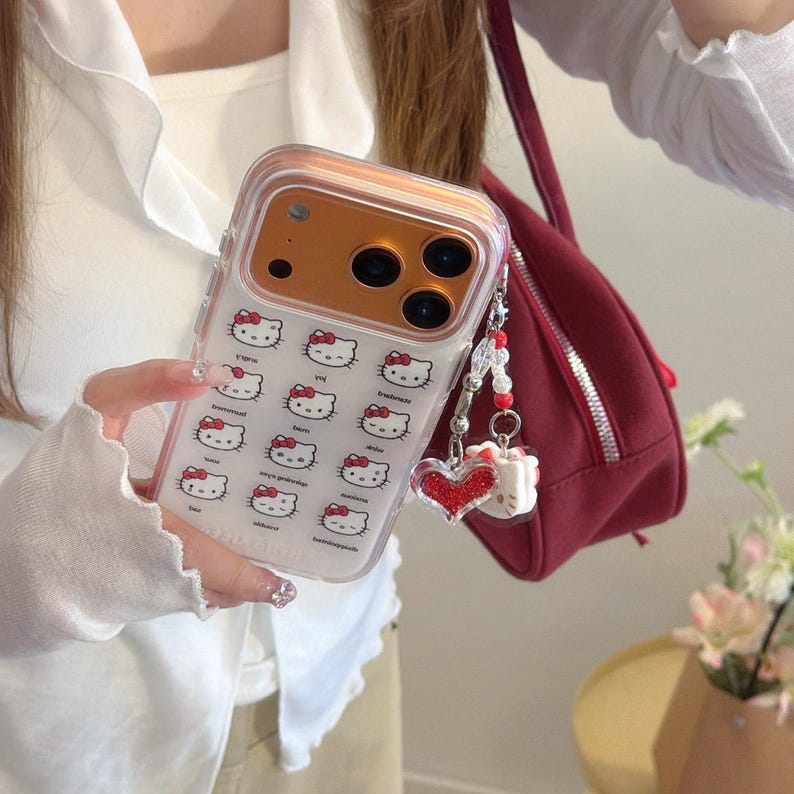 Süße Hello Kitty Handyhülle mit Band für iPhone 17 Pro Max, 17 Pro, 16 Pro Max Serie Bild 3