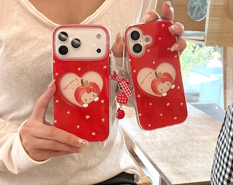 Bonita funda de teléfono de Hello Kitty para iPhone 17 Pro/16 Pro Max/15 Series, con cordón y diseños de manzana, estrella y corazón.