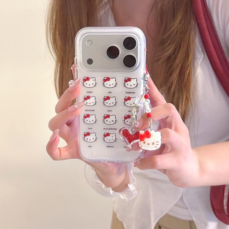 Süße Hello Kitty Handyhülle mit Band für iPhone 17 Pro Max, 17 Pro, 16 Pro Max Serie Case + Strap