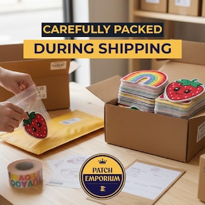 May include: A person packing colourful embroidered patches, including a smiling strawberry and a rainbow, into a box. The text "CAREFULLY PACKED DURING SHIPPING" is displayed above the box. The Patch Emporium logo is visible.