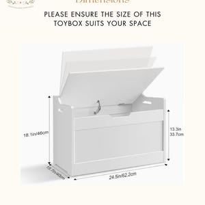 May include: White toy box with an open lid, showcasing its interior. Dimensions are provided: 24.5 inches wide, 18.1 inches high, and 15.7 inches deep. The text reads "Toy Box Dimensions" and "PLEASE ENSURE THE SIZE OF THIS TOYBOX SUITS YOUR SPACE."