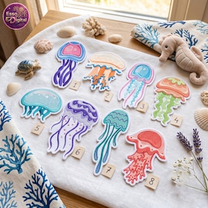 May include: Eight embroidered jellyfish patches in various colors including pink, orange, blue, purple, and red. Each patch is numbered from one to eight with small square tags. The patches feature detailed stitching and are arranged on a white fabric.