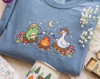 Embroidered Frog & Goose Campfire Shirt, Cute Campfire Animal Shirt, Cottagecore Comfort Colors Tee, Nature Lover Tee, Cozy Outdoor Gift