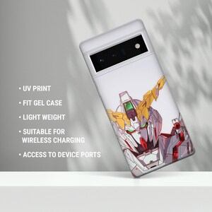 May include: White phone case featuring a detailed illustration of a robot's face with red, yellow, and green accents. The case has the following features: UV print, fit gel case, light weight, suitable for wireless charging, and access to device ports.