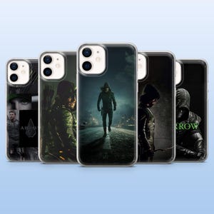 May include: Five phone cases with images of a hooded figure in a dark setting. The cases show action shots of the character. The cases are arranged in a row, against a blue backdrop.