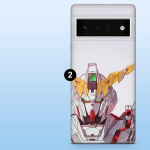 May include: White phone case featuring a detailed illustration of a robot's head with red, yellow, and green accents. The robot has a complex design with sharp angles and mechanical details. The case is for a Google Pixel phone.