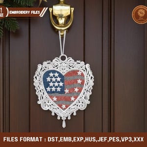 May include: A heart-shaped patriotic decoration with a white filigree border, hanging on a wooden door. The heart features a blue section with white stars and red and white stripes, resembling the American flag. The text "EMBROIDERY FILES" is visible.