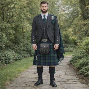 May include: A man in traditional Scottish attire, featuring a grey tweed jacket, waistcoat, and a blue and green tartan kilt. He is wearing a matching tartan sash, a sporran, and black dress shoes. The outfit is completed with black knee socks and a green tie.