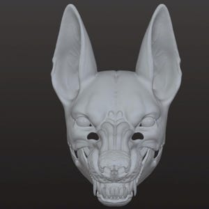 May include: A light gray, three-dimensional digital sculpture of a canine head. The model features pointed, upright ears, a textured snout, and an open mouth revealing sharp teeth. The surface is smooth with visible structural lines and contours.