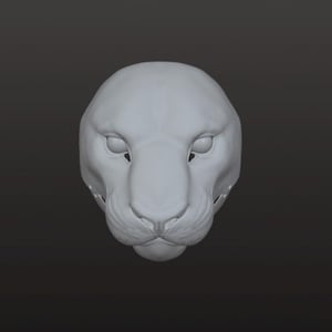 May include: A light gray, three-dimensional digital sculpture of a feline head. The model features a smooth, matte surface with defined facial contours, including almond-shaped eyes, a prominent nose, and detailed whisker pads on the muzzle.