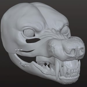 Op de afbeelding: Een 3D-geprint, lichtgrijs honden schedel met gedetailleerde kenmerken. Het model bevat zichtbare tanden, oogkassen en een getextureerde snuit. Het ontwerp is een gestileerde weergave van een hond of wolf.