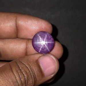 Rubí estrella natural de 27,00 ct, cabujón, rojo, gema suelta sin tratar, ovalada.