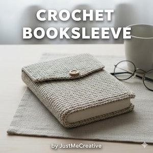 May include: A crocheted book sleeve in a light gray color, with a flap secured by a wooden button. The text "CROCHET BOOKSLEEVE" is displayed at the top. The book sleeve is resting on a gray linen surface.
