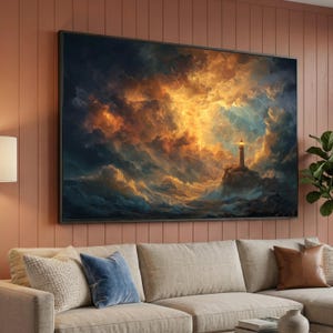 May include: A framed canvas print depicting a dramatic seascape with a lighthouse. The artwork features a stormy sky with swirling clouds in shades of orange, yellow, and blue. The lighthouse stands on a rocky outcrop, illuminated by a bright light.