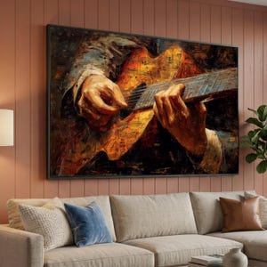 Può includere: Dipinto astratto di una persona che suona la chitarra. L'opera d'arte presenta toni caldi di marrone, arancione e giallo, con note musicali visibili. Le corde e la tastiera della chitarra sono dettagliate e le mani sono sullo strumento.