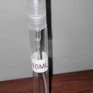 Lattafa Khamrah Waha | 3ml / 5ml / 10ml | Doftdekanteringar | Prover | Resestorlek bild 7