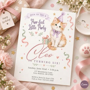 May include: A rectangular birthday invitation card featuring a watercolour illustration of a ginger and white kitten wearing a purple party hat and bow. The text reads: Join us for a Purr-fect Little Party, Cleo is turning six, Sunday, June 22nd.