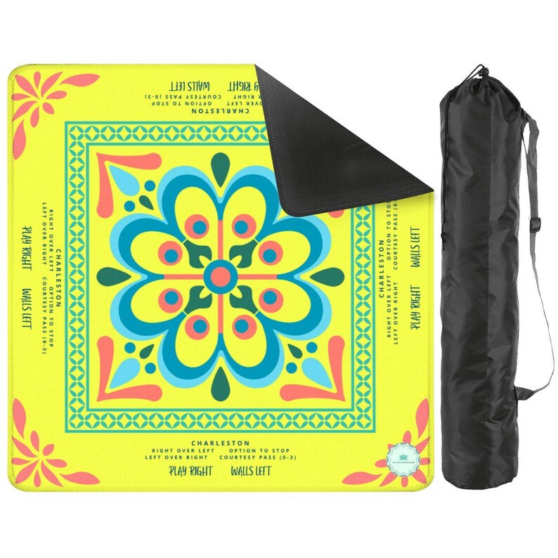 This is a mahjong mat with a brightly colored tile in the center.