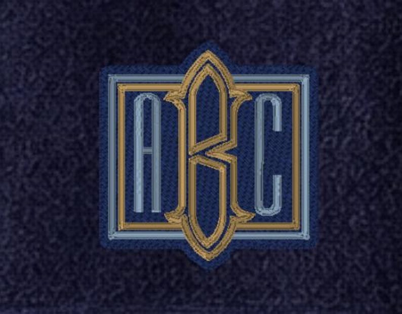 May include: A square-shaped embroidered patch featuring the letters A, B, and C. The letter B is centered and larger, flanked by the letters A and C. The design uses gold and light blue thread on a dark blue textured fabric background.