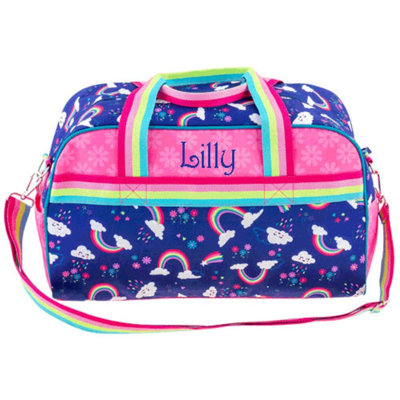 Front view of the rainbow pattern duffle bag with name, has carry handles and shoulder strap. One large open area and 2 small side pockets on the our side,