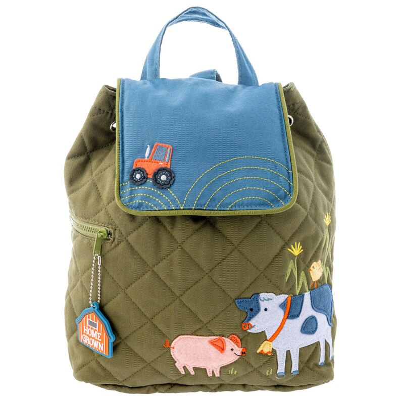 May include: A green quilted backpack with a blue flap featuring a tractor, a cow, a pig, and a chick. The backpack has a zippered pocket and a charm that says "Home Grown".