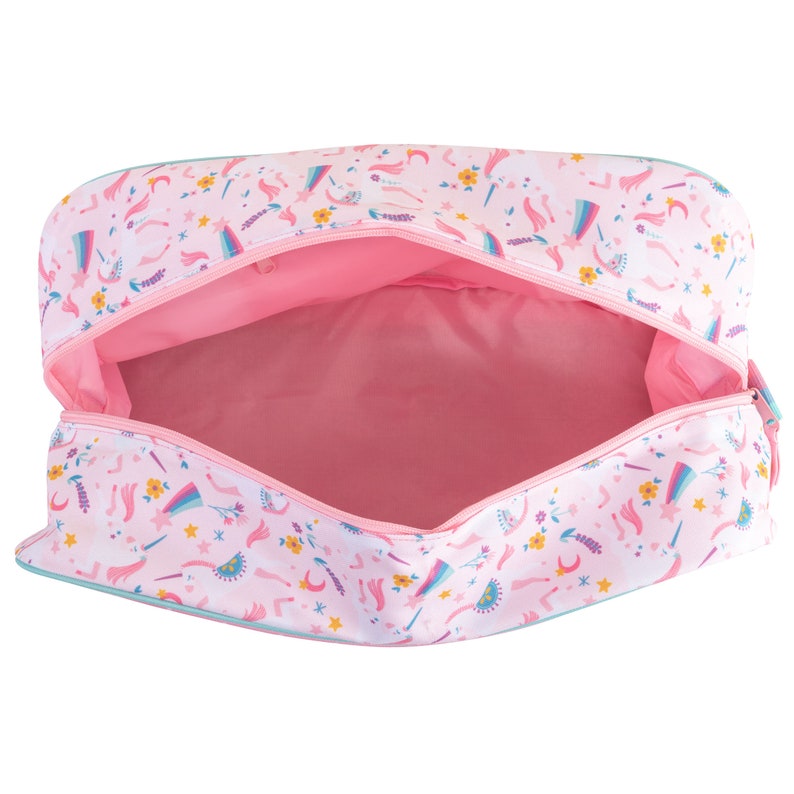 May include: A light pink zippered pouch featuring a repeating pattern of white unicorns, colorful rainbows, yellow flowers, and pink crescent moons. The interior is lined with solid pink fabric, and the bag is open to reveal the spacious compartment.