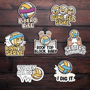 May include: A collection of volleyball-themed stickers with various designs. The stickers feature volleyballs with text like "Libero Life," "Bump. Set. Spike," and "I Dig It." The stickers are in shades of yellow, blue, and white.