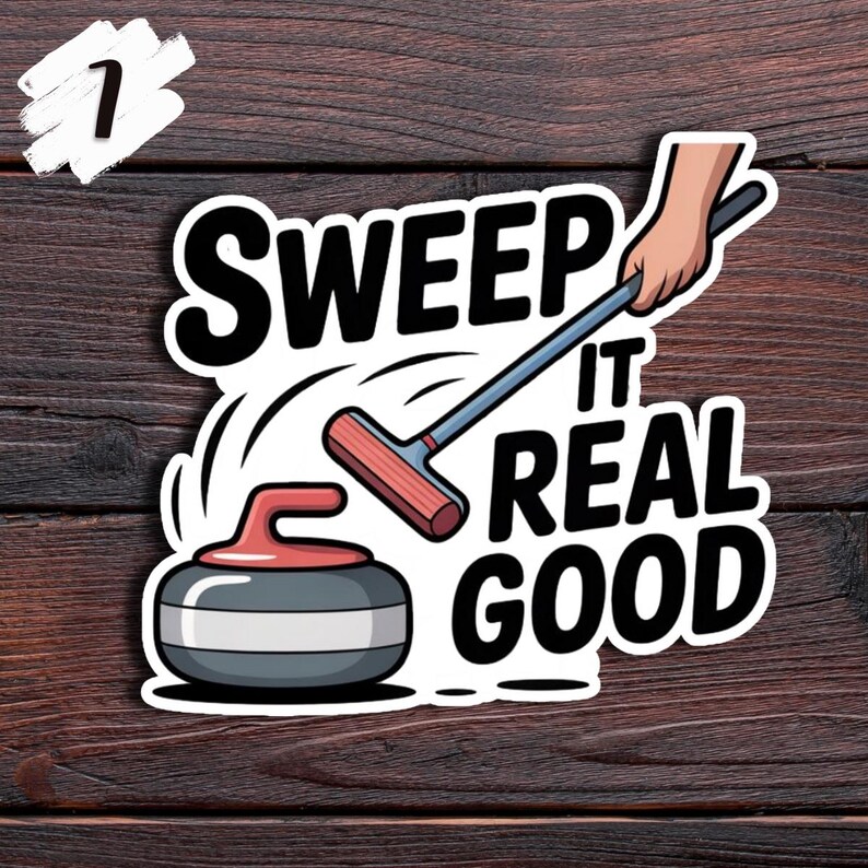 May include: A white sticker with a curling theme. The sticker features a curling stone, a broom, and the words "Sweep It Real Good" in bold black letters. The background is a wooden surface.