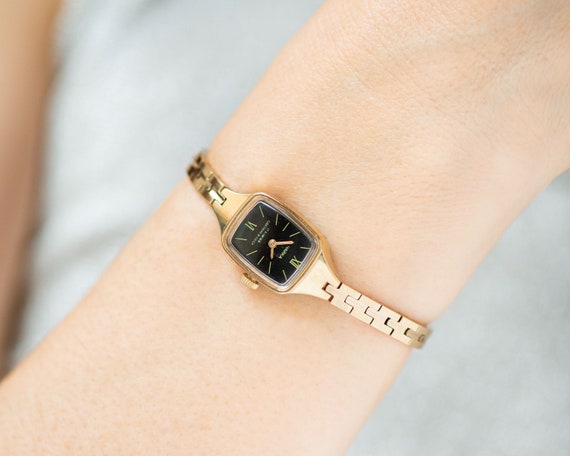 delicate gold watch