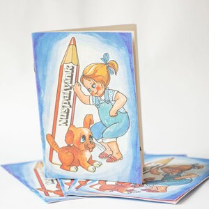 May include: A colorful illustration of a girl and a puppy standing next to a large red crayon. The crayon has the word "Nuspalvin" written on it. The girl is wearing a blue overall dress and has blonde hair. The puppy is brown and white. The illustration is on a blue background.