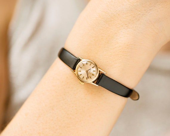 Omega Mechanisch dameshorloge met diamant 18K + Gratis cadeau