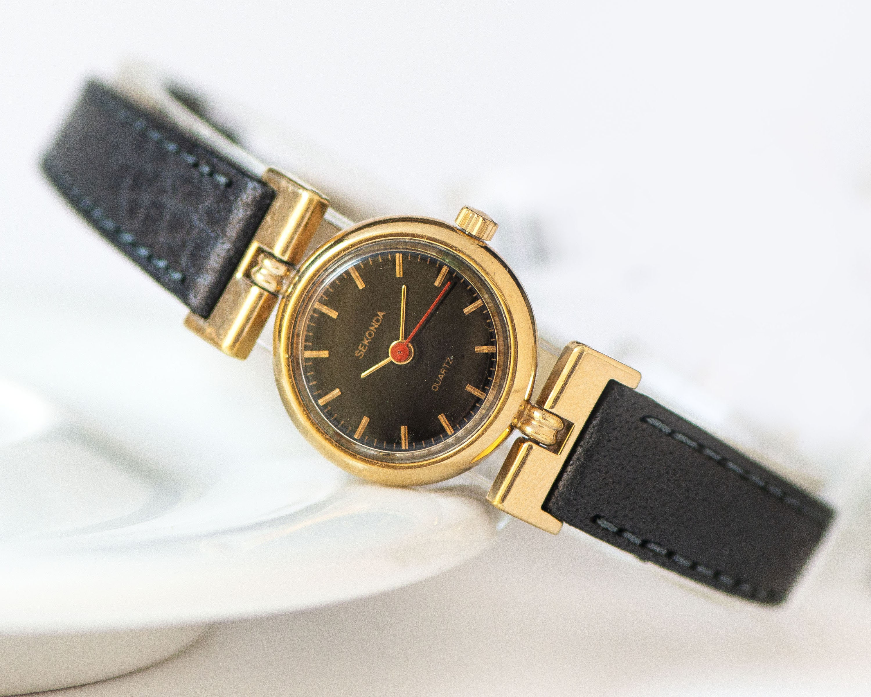 Sekonda black sales and gold watch