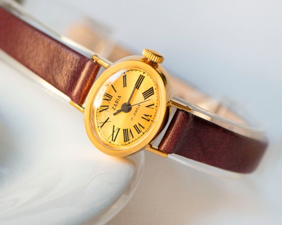 JewelryWe Orologio da Donna alla Moda al Lavoro: Quadrante Ovale Cinturino in Acciaio Inossidabile Regolabile Bracciale da Ragazze Regalo per Lei