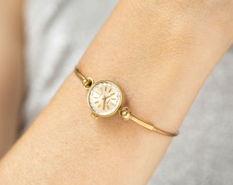 delicate silver watch