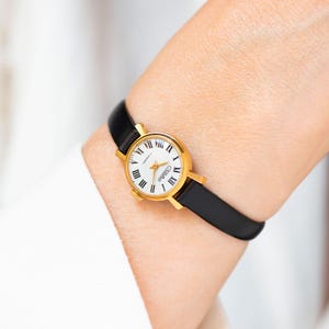 Orologio da polso di classe da donna, regalo minuscolo, placcato oro Glory vintage, orologio elegante per signora, quadrante minimalista con numeri romani, cinturino in pelle di lusso, nuovo