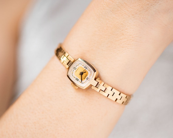 delicate gold watch
