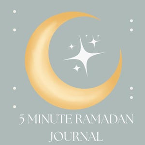 May include: A journal cover with a light gray background. A golden crescent moon and white stars are centered. The text "5 MINUTE RAMADAN JOURNAL" is below the moon in a serif font.