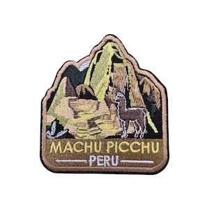 May include: Embroidered patch featuring Machu Picchu, Peru. The design includes a mountain range, an alpaca, and the text "Machu Picchu Peru" in a tan and brown color scheme. The patch has a brown border.