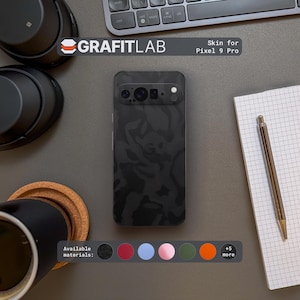 May include: A black camouflage skin for a Pixel 9 Pro phone, displayed on a gray surface. The phone skin is the focal point, with the text "GRAFITLAB" and "Skin for Pixel 9 Pro" visible. A color palette of available materials is shown below the phone.