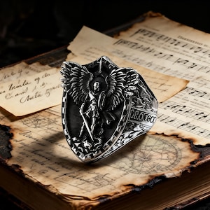 May include: A set of three ceramic nesting bowls in shades of blue, green, and white. The bowls have a speckled glaze and a simple, modern design. The largest bowl is approximately 15 cm in diameter.