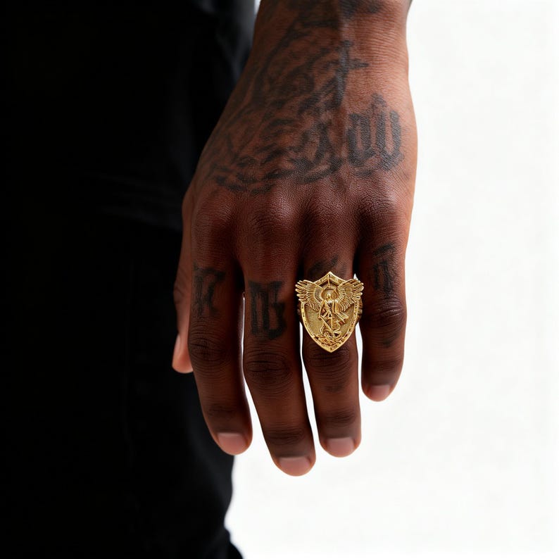 May include: A white ceramic mug with a black handle and the text "But First, Coffee" in a handwritten style. The mug is on a white surface. The mug is approximately 10 cm tall.