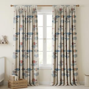 May include: Beige window curtains with a repeating pattern of blue and red fish. The curtains are hanging in front of a white window. A wooden curtain rod is visible at the top. The curtains are pleated and have a textured appearance.