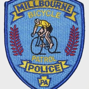 May include: A handmade wooden sign with the text "Welcome" in a handwritten style. The sign is painted white with a distressed finish, and a small green leaf is attached to the top. The sign measures approximately 12 inches wide.