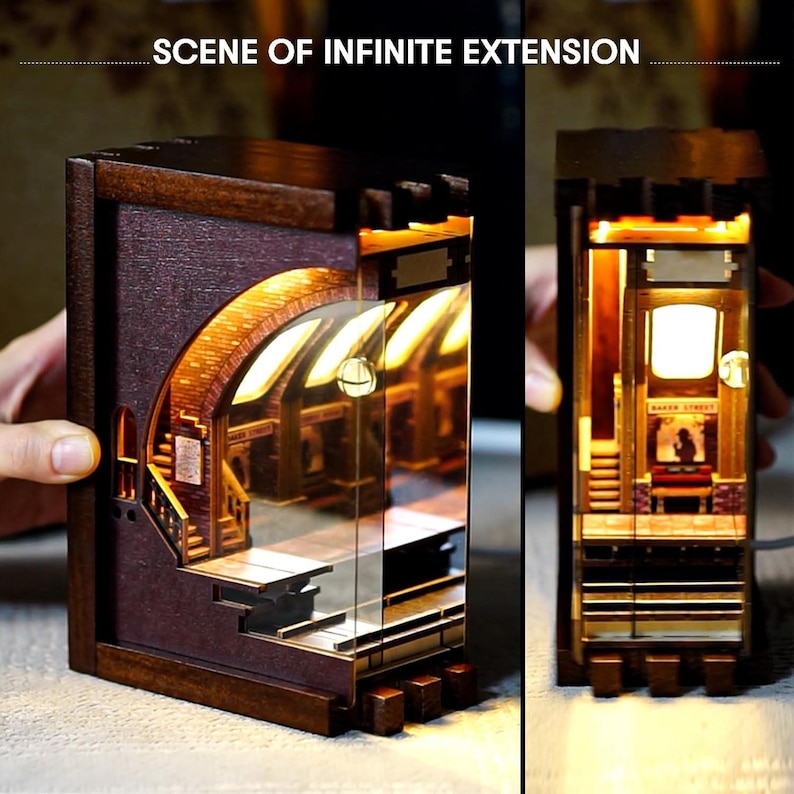 May include: A wooden, illuminated diorama of a scene with the text "SCENE OF INFINITE EXTENSION". The diorama features a detailed interior with stairs, arches, and a sign that reads "BAKER STREET". The warm lighting creates a cozy atmosphere.