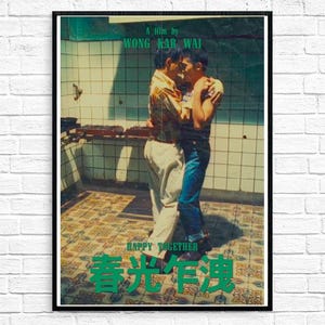 May include: A framed movie poster for "Happy Together" by Wong Kar-wai. The poster shows two men embracing, set against a tiled background. The title is in both English and Chinese characters, with a vintage aesthetic.