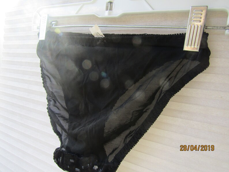 black panties with velvet on the front med