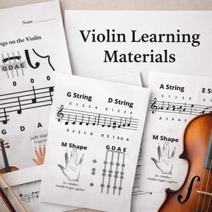 May include: A violin and learning materials are displayed on a light surface. The materials include sheet music with musical notes and finger placement guides. The violin is brown with black strings. The text "Violin Learning Materials" is visible.