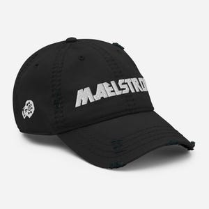 Puede incluir: Gorra de béisbol negra desgastada con texto bordado en blanco que dice "MAELSTROM".