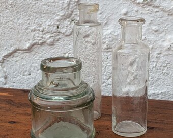Curated Antique Apothecary Bottles Set | Early 20th Century Clear Glass Medicine Vials | Vintage Chemist Display Decor