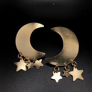 Star and moon statement earrings